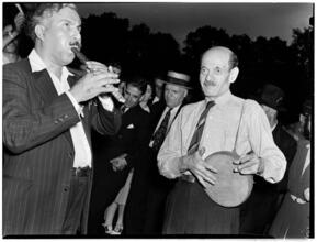 [Men playing instruments.]