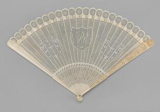 Brisé fan of carved and pierced ivory with original case