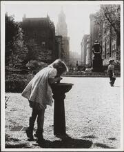Child drinking from water fountain, Gramercy Park