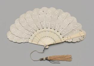 Folding fan of spangled ice-blue silk