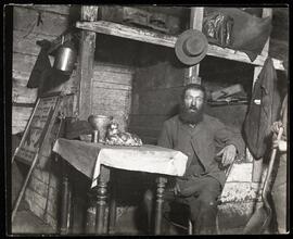 "Ready for Sabbath Eve in a Coal Cellar" - a cobbler in Ludlow Street.