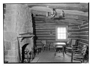 West side Y.M.C.A. Log cabin to window.