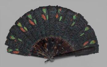 Folding feathered fan of black iridescent feathers
