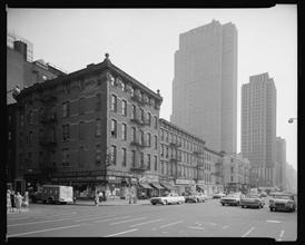 Block, east side of 6th Avenue from 53rd to 54th Street, view looking S.E. from N.W. corner of 54th Street.