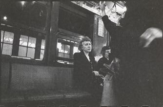 Life and Love on the New York City Subway [Woman on a subway.]