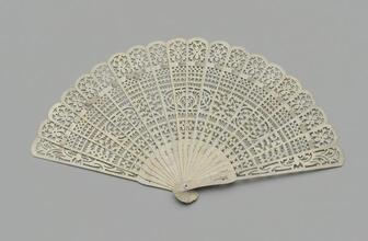 Folding fan of pierced ivory