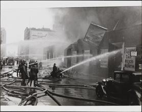 [Fire at West 50th Street, after the walls fell.]