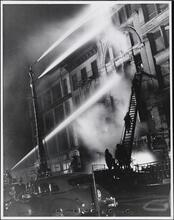 [Building on fire.]