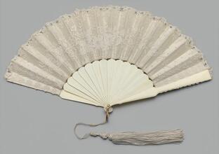 Folding fan of Brussels lace and white satin with original box