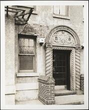 1475 Grand Concourse. Theodore Roosevelt Apartments. Detail fallen stucco above entrance to apartment "G"