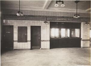 [Interior of an unidentified train station.]