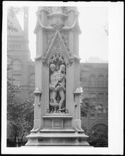 Broadway and Wall Street. Trinity Churchyard.  Astor Memorial Cross, detail of Adam and Eve.