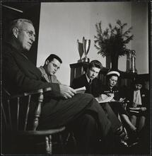 Columbia University [Professor with students in an office.]