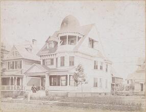 [Jas. F. Booth on steps of his residence, 761 or 731 East 31st Street.]