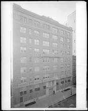 114 East 84th Street, south side between Lexington and Park Avenues. Apartment house.