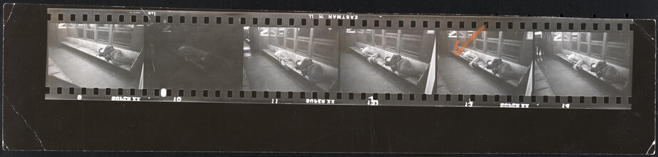 Life and Love on the New York City Subway [Man sleeping in a subway.]