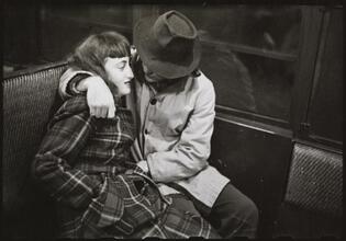 Life and Love on the New York City Subway [Couple sleeping on a subway.]