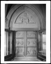 Broadway and Wall Street. Old Trinity Church, north bronze doors.