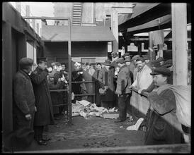 East 110th Street at the Harlem River. Distributing coke [coal] to the poor people.
