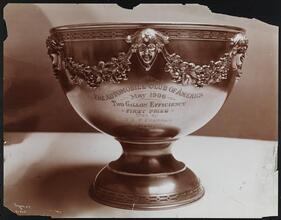 Autos, Decauville Auto Co., 2 gallon efficiency cup.