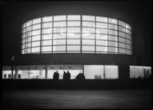 [Night view of the Glass Inc. building, New York World's Fair.]