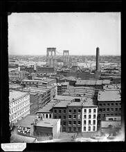 [Brooklyn Bridge under construction.]