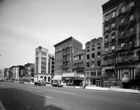 [La Boheme, Anderson Theatre, Metro Cabinet Craft and William Bruder Real Estate & Insurance on Second Avenue.]