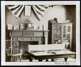 [Interior, Ping-pong table & fireplace.]