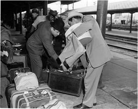 Circus [Men with luggage.]
