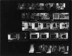 [Dinner party, Union Square, paintings by Reginald Marsh and portraits of a man.]
