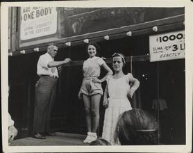 [Coney Island sideshow performers on midway.]
