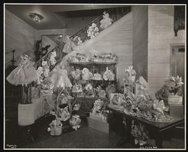 Schrafft's, 386 Fulton Street, B'klyn, Interior, Tables and Stair Rail with Candy Boxes and Doll.