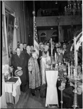 [Men attending a religious service.]