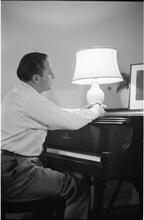 Christopher Lynch [Christopher Lynch, Irish tenor, at a piano.]