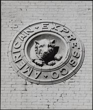[Bulldog emblem on the American Express Horse Stables, Hubert Street façade.]