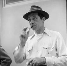 Circus [Circus performer smoking.]