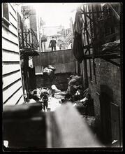 Baxter Street Alley, directly in the rear of Bandits' Roost.
