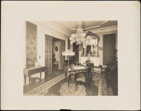 [Residence. Interior, parlor.]
