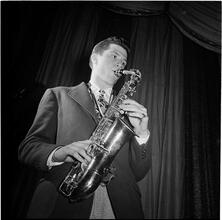 Swing Band Contest Sponsored by LOOK [Man playing the saxophone.]
