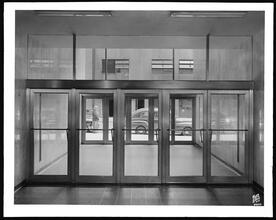 100 Park Avenue. 41st Street entrance, interior, bronze doors.