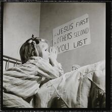 Orphanage [Girl praying.]
