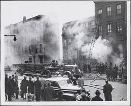 [Building on fire.]