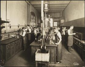 East 8th Street and Third Avenue. Cooper Union. Students at Cooper Union working in lab