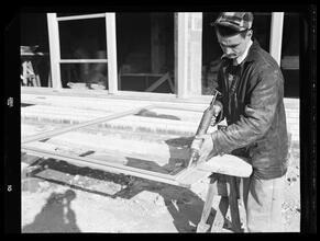 750 3rd Avenue Between 46th and 47th Street. [Construction view], Caulking Casement Before Raising Into Place