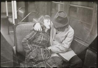 Life and Love on the New York City Subway [Couple sleeping on a subway.]
