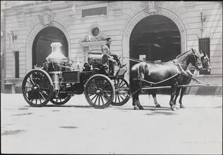 [Horse-drawn steam pumper.]
