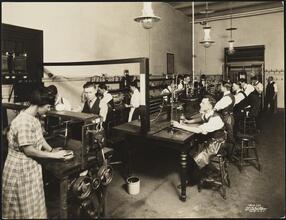 East 8th Street and Third Avenue. Cooper Union. Students at Cooper Union working in lab