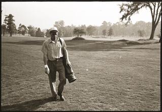 Walter Cartier, Prizefighter of Greenwich Village [Walter Cartier playing golf.]
