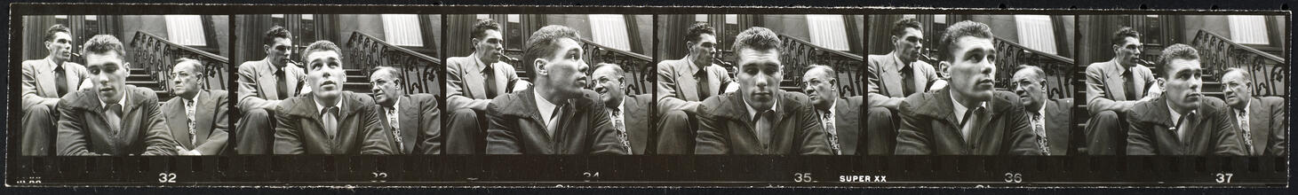 Walter Cartier, Prizefighter of Greenwich Village [Walter and Vincent Cartier with an unidentified man sitting on steps.]