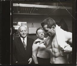 Rocky Graziano, He's a Good Boy Now [Rocky Graziano with two men.]